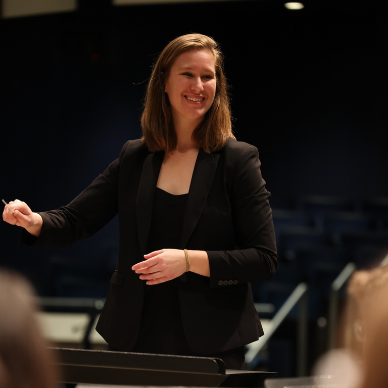 Kara Metzger conducting