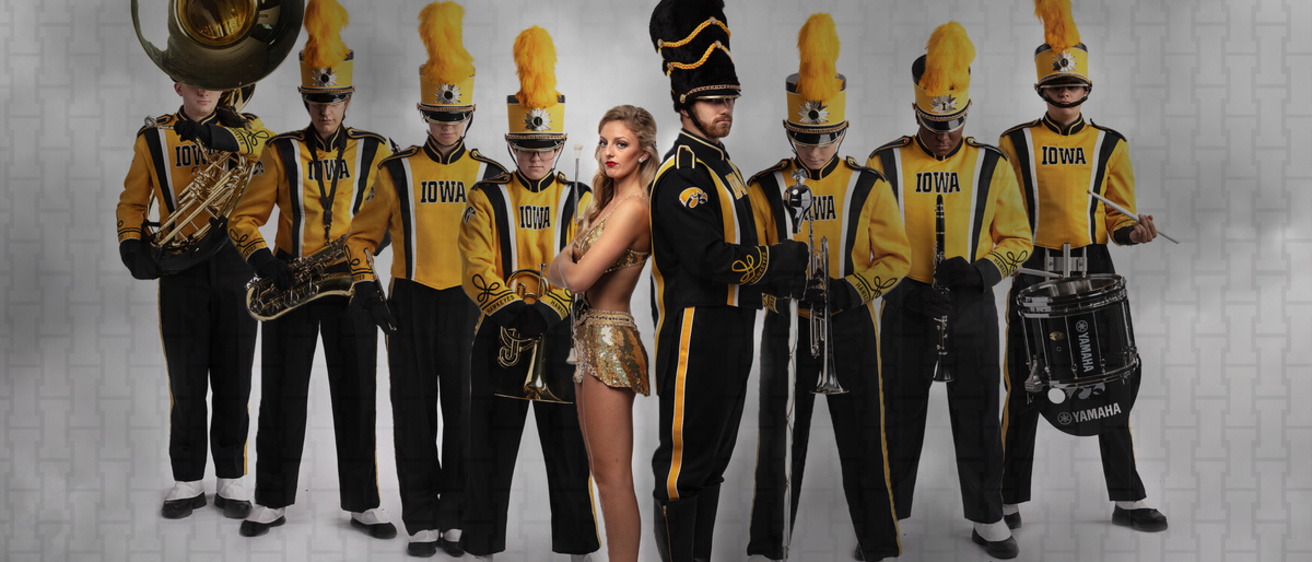 Hawkeye Marching Band members in "flying v" formation